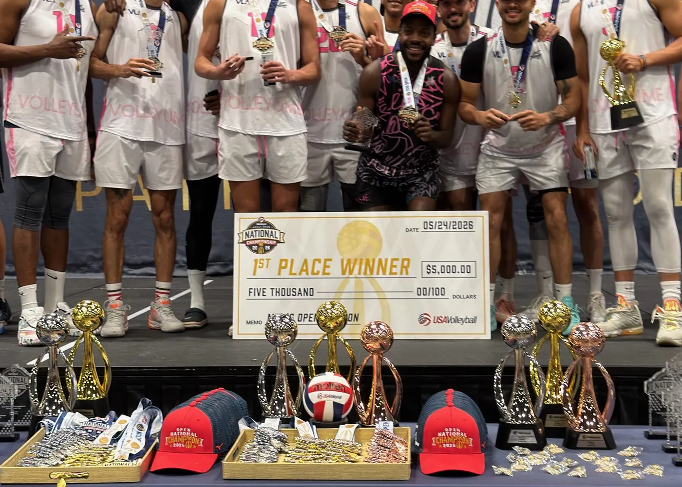 Volleyume 2026 USAV Open National Champions on the podium